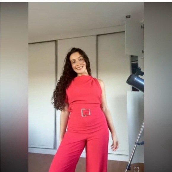 ASYMMETRIC CREPE BUCKLE JUMPSUIT
RED / CORAL . SIZE M, L - Picture 7 of 16